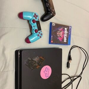 Sony PlayStation 4 Console with Black and Teal Controllers